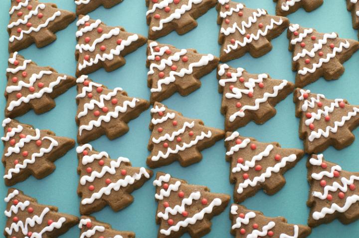An array of decorated gingerbreads painted as christmas trees