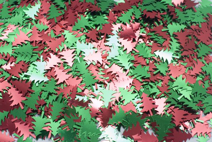 hundreds of metallic christmas tree shapes in red and green colours