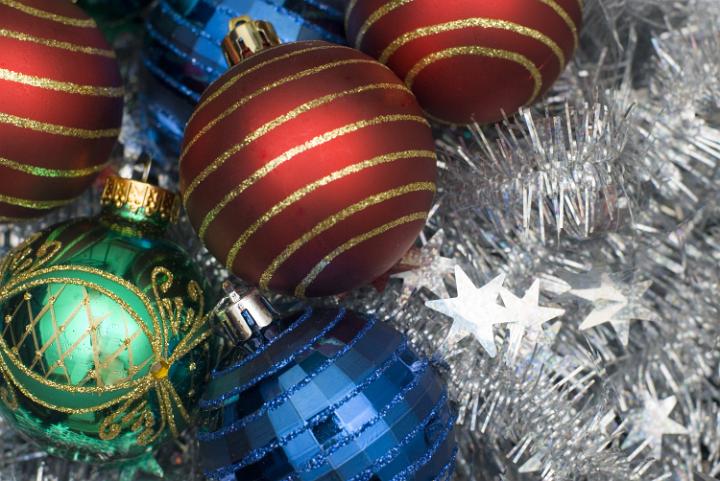close-up image of red, green and blue christmas baubles