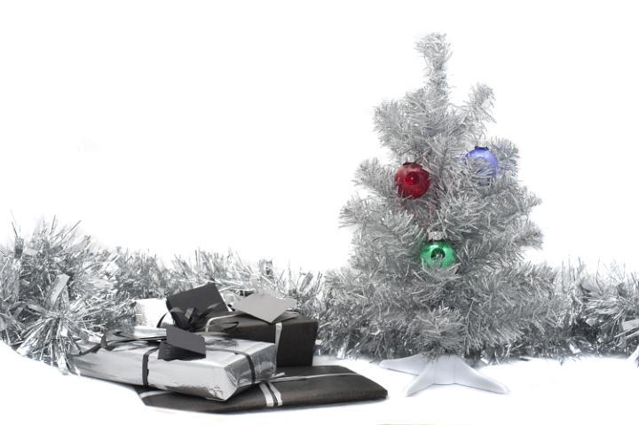 a silver christmas still life - decorative tree and gifts