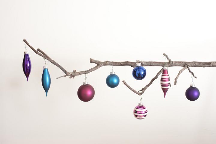 Christmas balls hanging on branch