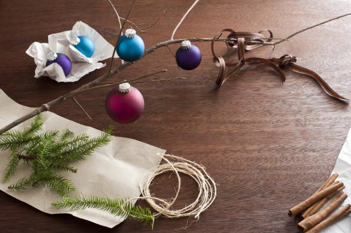Assorted Christmas decorations on a wooden table