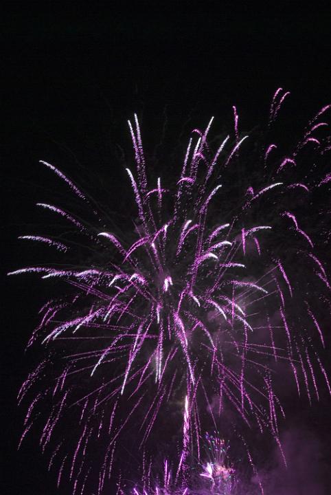 rockets at a new years eve firework display to welcome in the new year