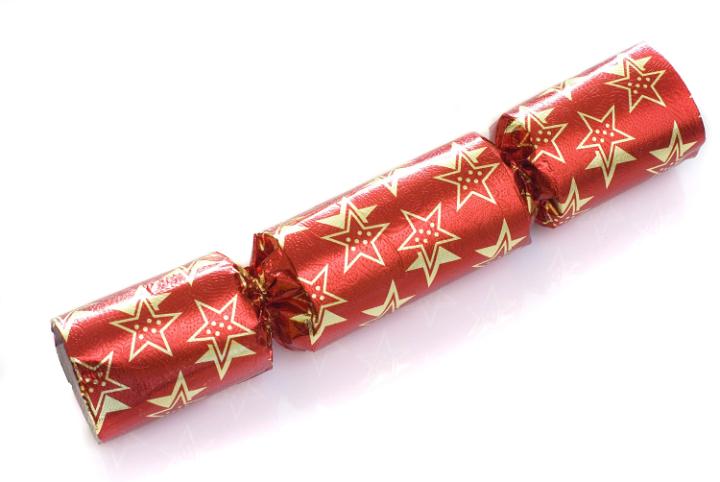 A single red christmas cracker isolated on a white background