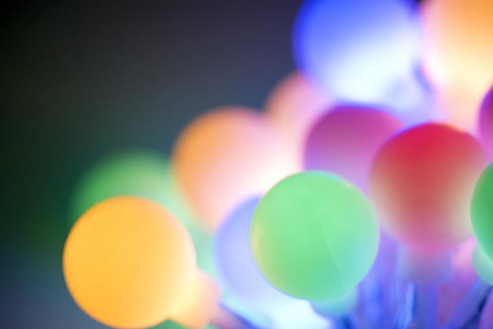 Diffuse background of pastel coloured christmas ball lights
