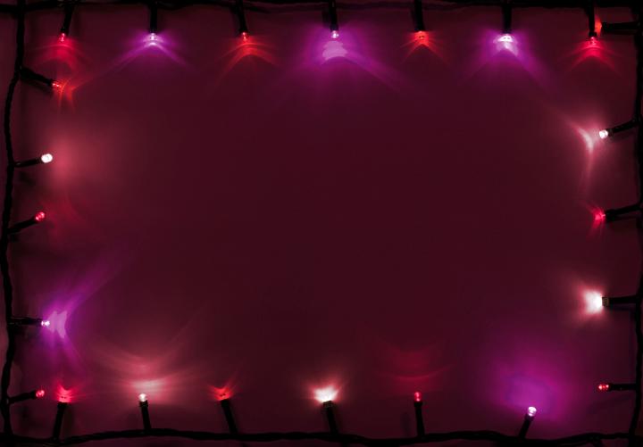 Garland pink and red lights. Copy space. From above.